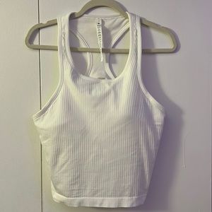 EBB TO STREET CROPPED RACERBACK TANK TOP
